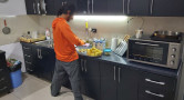 Man at kitchen counter cooking