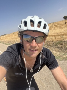 A man riding his bicycle