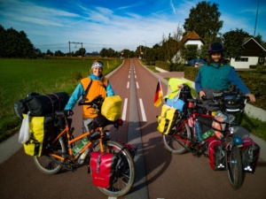 Two people on touring bicycles 