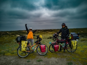 Two people on touring bicycles 